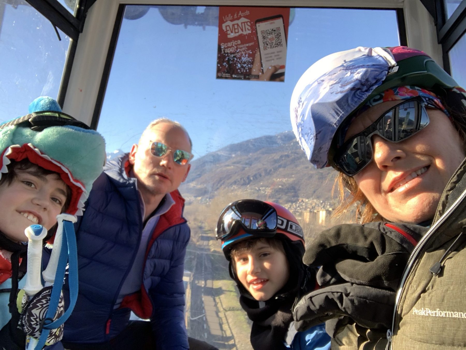 Going up the gondola in Pila on Christmas day. Our Christmas holidays in the mountains with the kids and our dog! Courmayeur, Aosta.