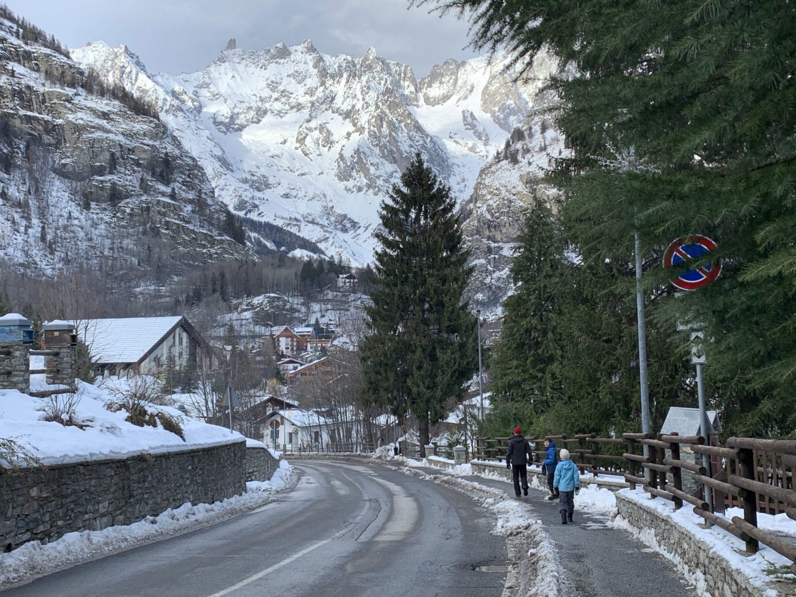Walking from Dolone to Courmayeur. The scenery is amazing. Our Christmas holidays in the mountains with the kids and our dog! Courmayeur, Aosta.