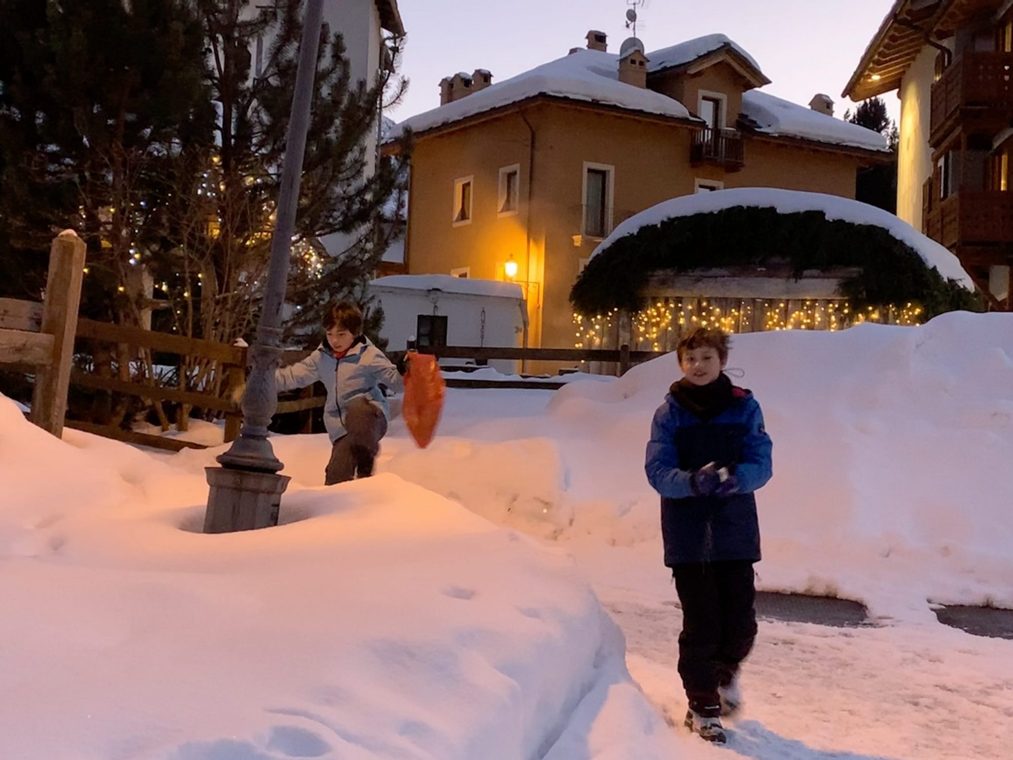 They always managed to get deep in snow. Our Christmas holidays in the mountains with the kids and our dog! Courmayeur, Aosta.