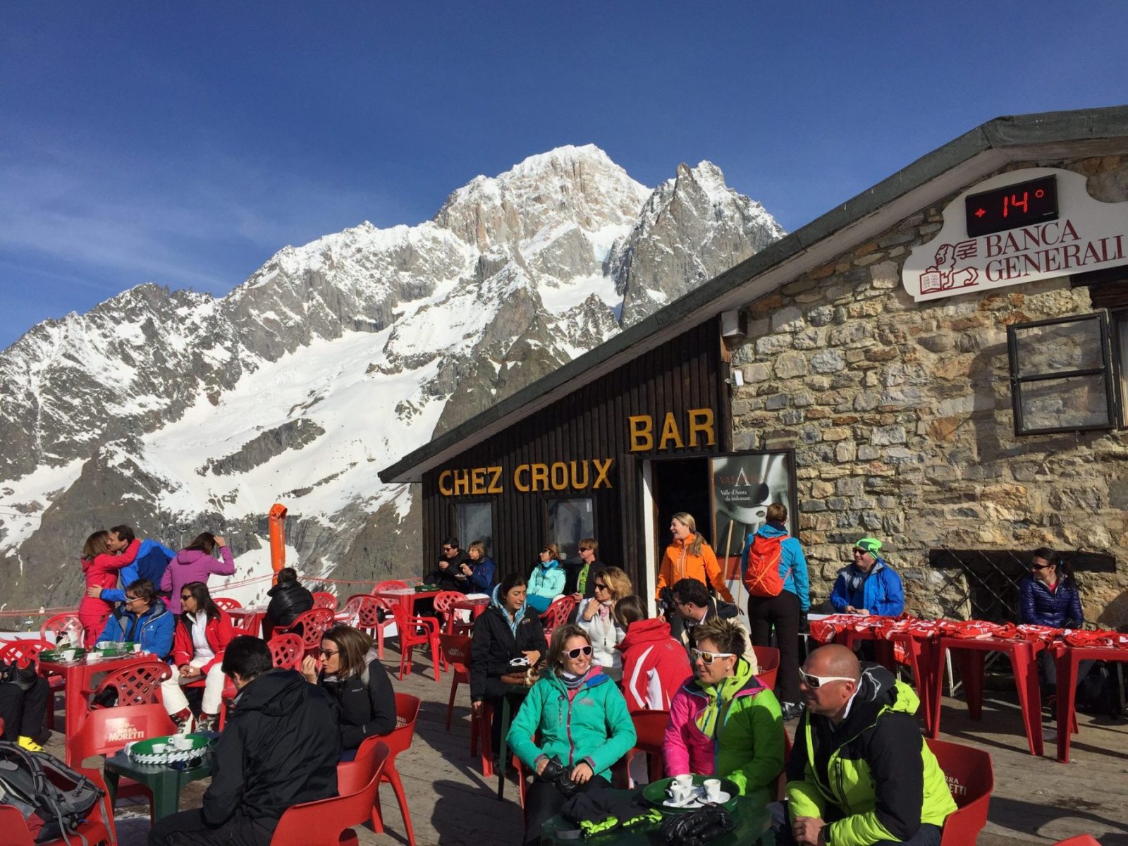 Chez Croux's terrace. Views of Monte Bianco behind. A Foodie Guide to on-Mountain Dining in Courmayeur. 