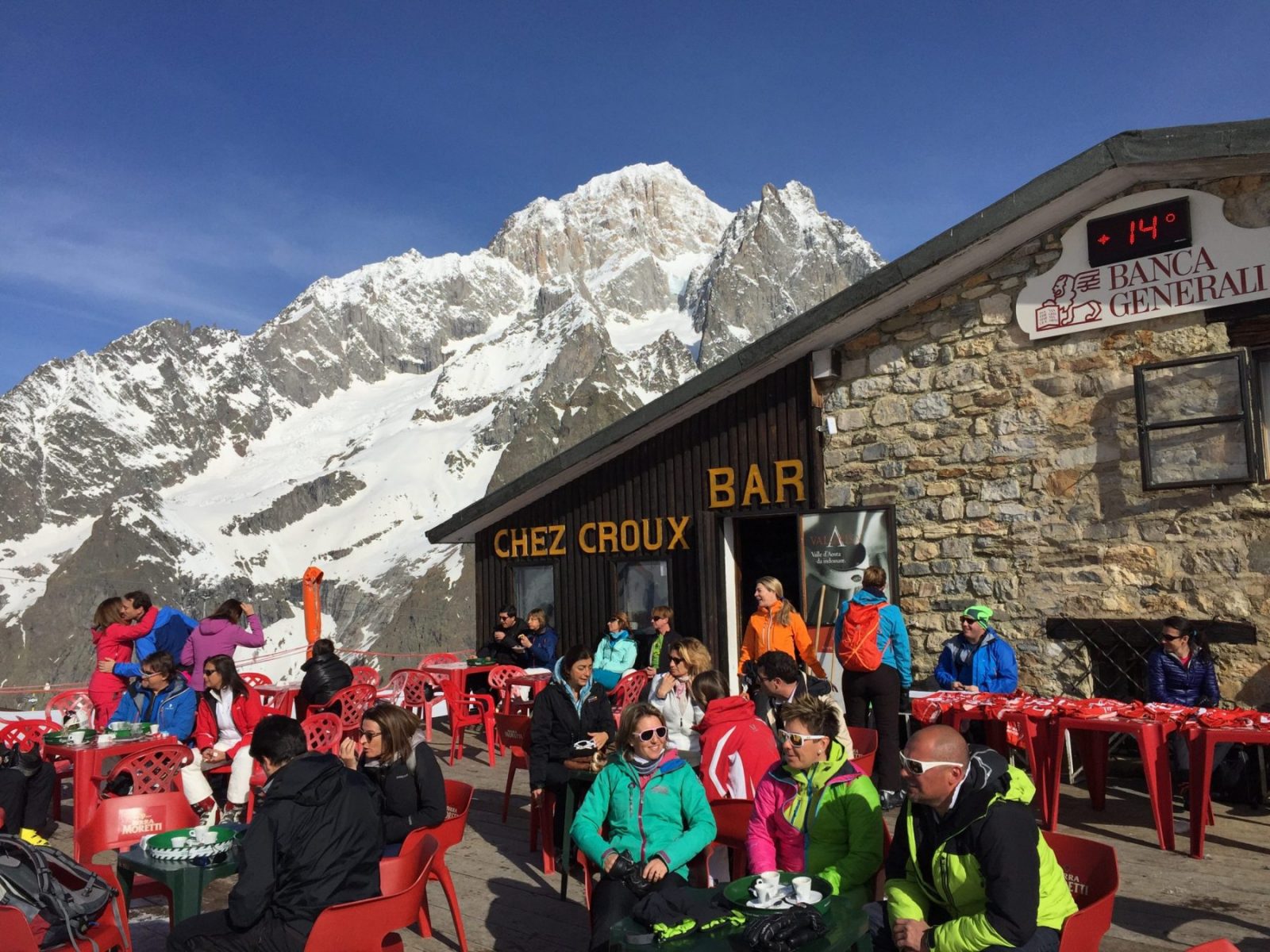 Chez Croux's terrace. Views of Monte Bianco behind. A Foodie Guide to on-Mountain Dining in Courmayeur.