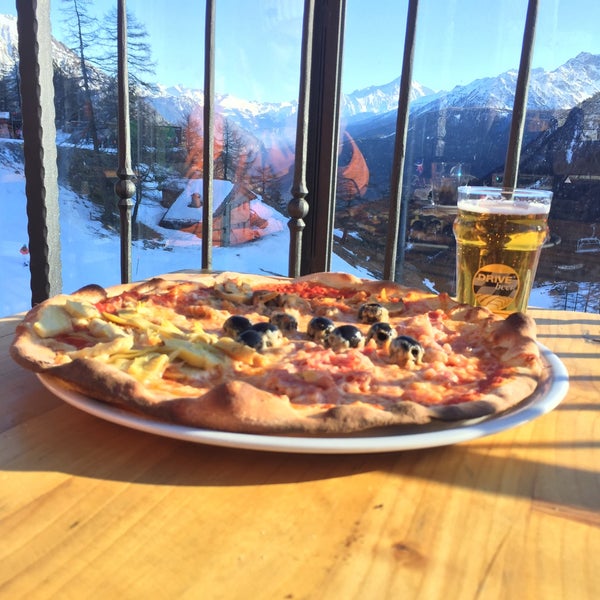 Pizza with the views - inside Chez Ollier. A Foodie Guide to on-Mountain Dining in Courmayeur.