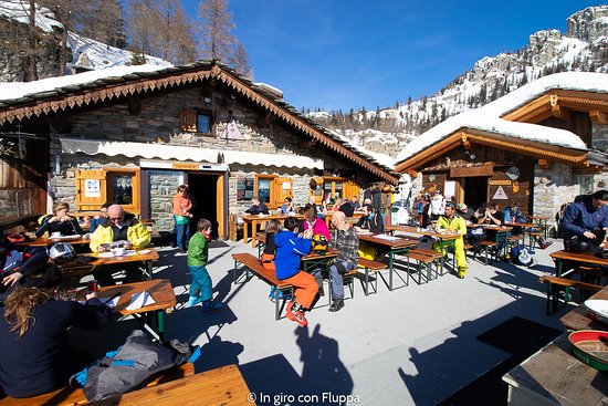 Chez Ollier exterior. A Foodie Guide to on-Mountain Dining in Courmayeur.