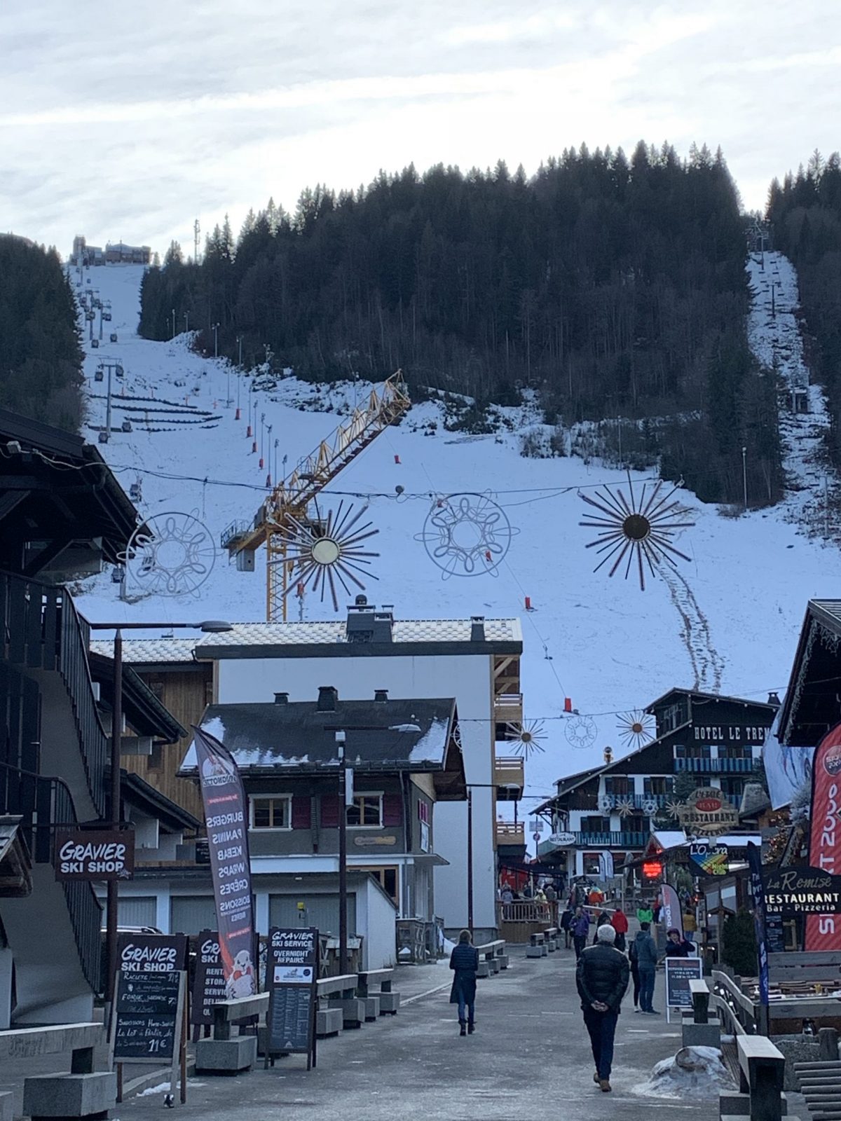 Downtown Morzine with the Pleney lift on the background. A Mums’ Long Weekend in Morzine.