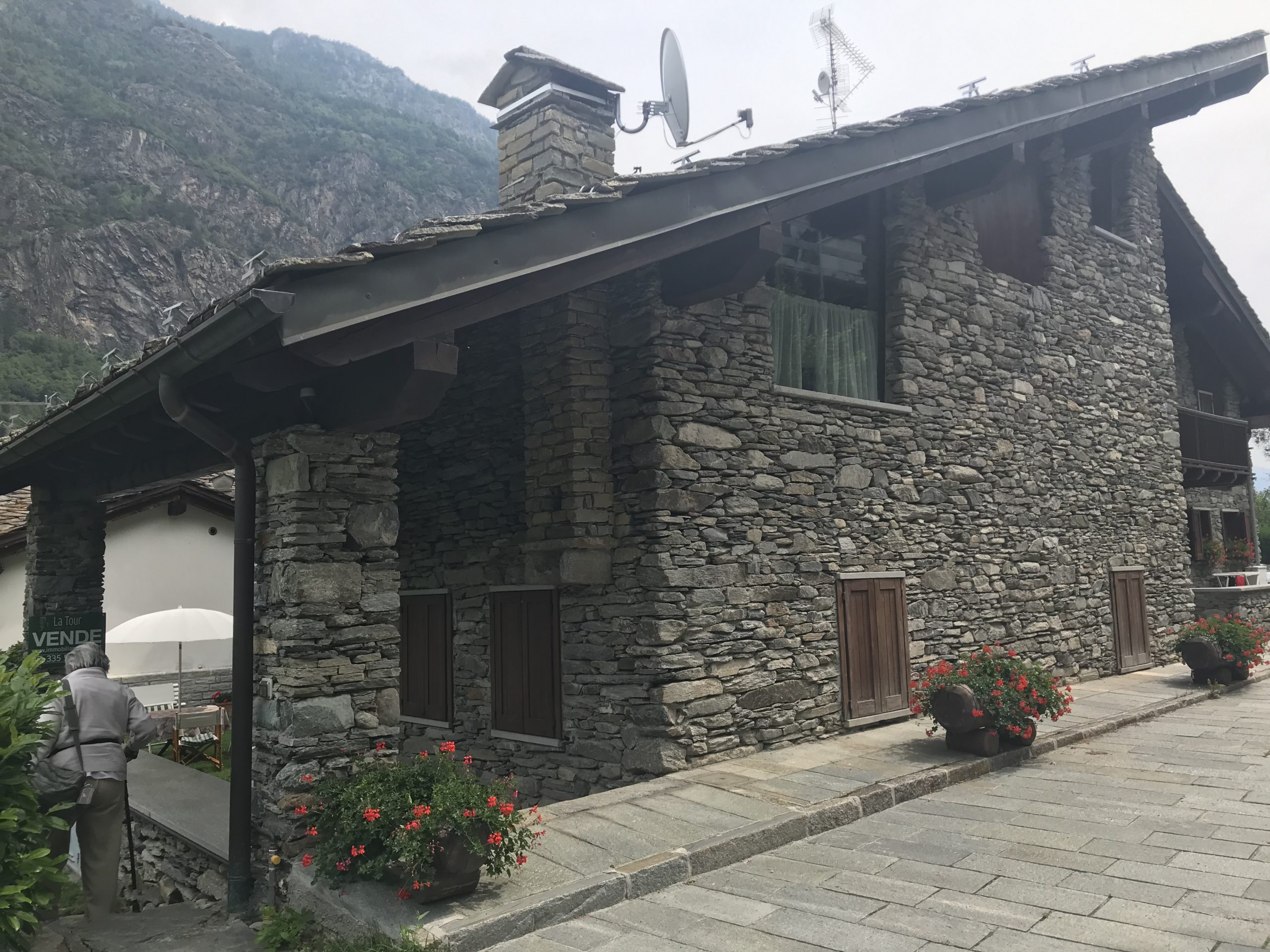 The flat was in this stone house in Derby. Beautiful views of the Mont Blanc from the garden. My experience of buying a home in the Italian Alps.