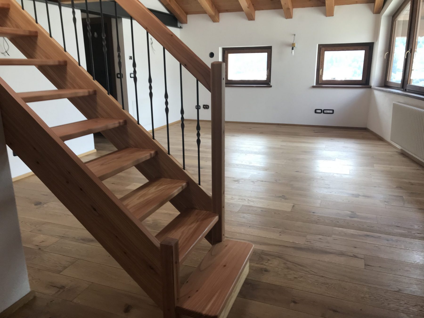 The flat of La Salle with three bedrooms, two bathrooms and a mezzanine. My experience of buying a home in the Italian Alps.