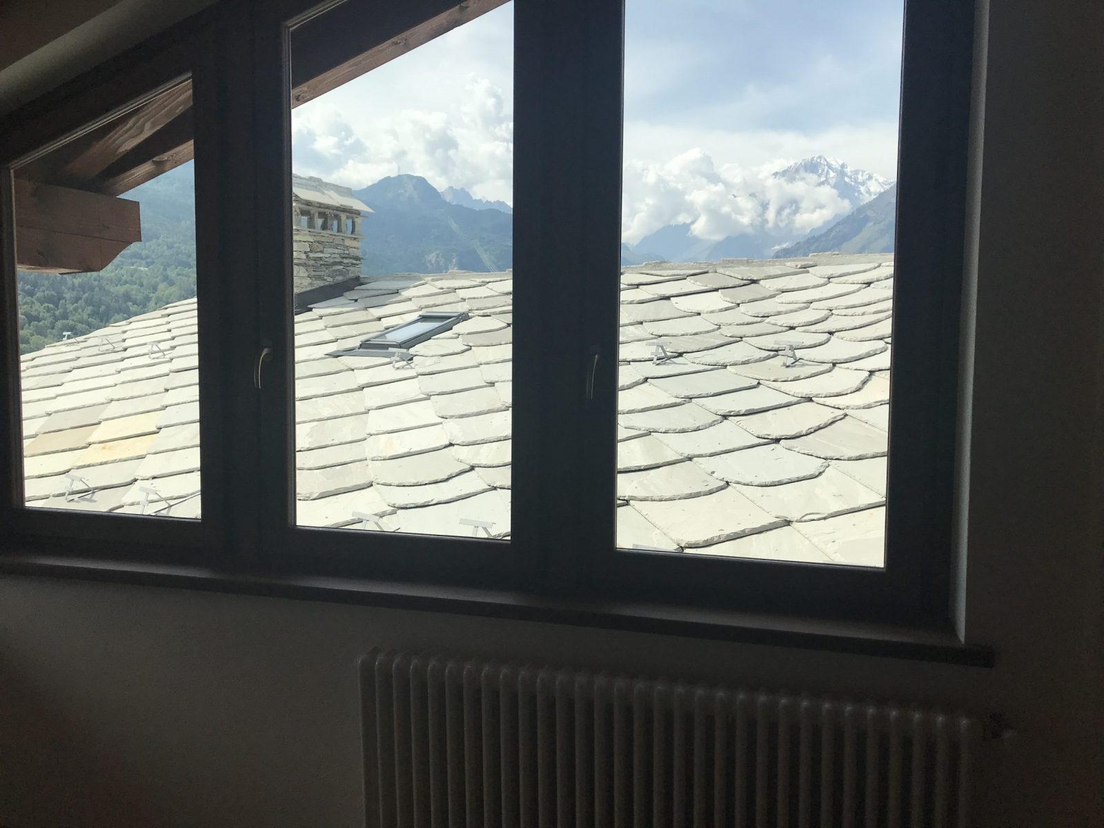 The mountain you see from the window is the Monte Bianco. The apartment in La Salle. My experience of buying a home in the Italian Alps.