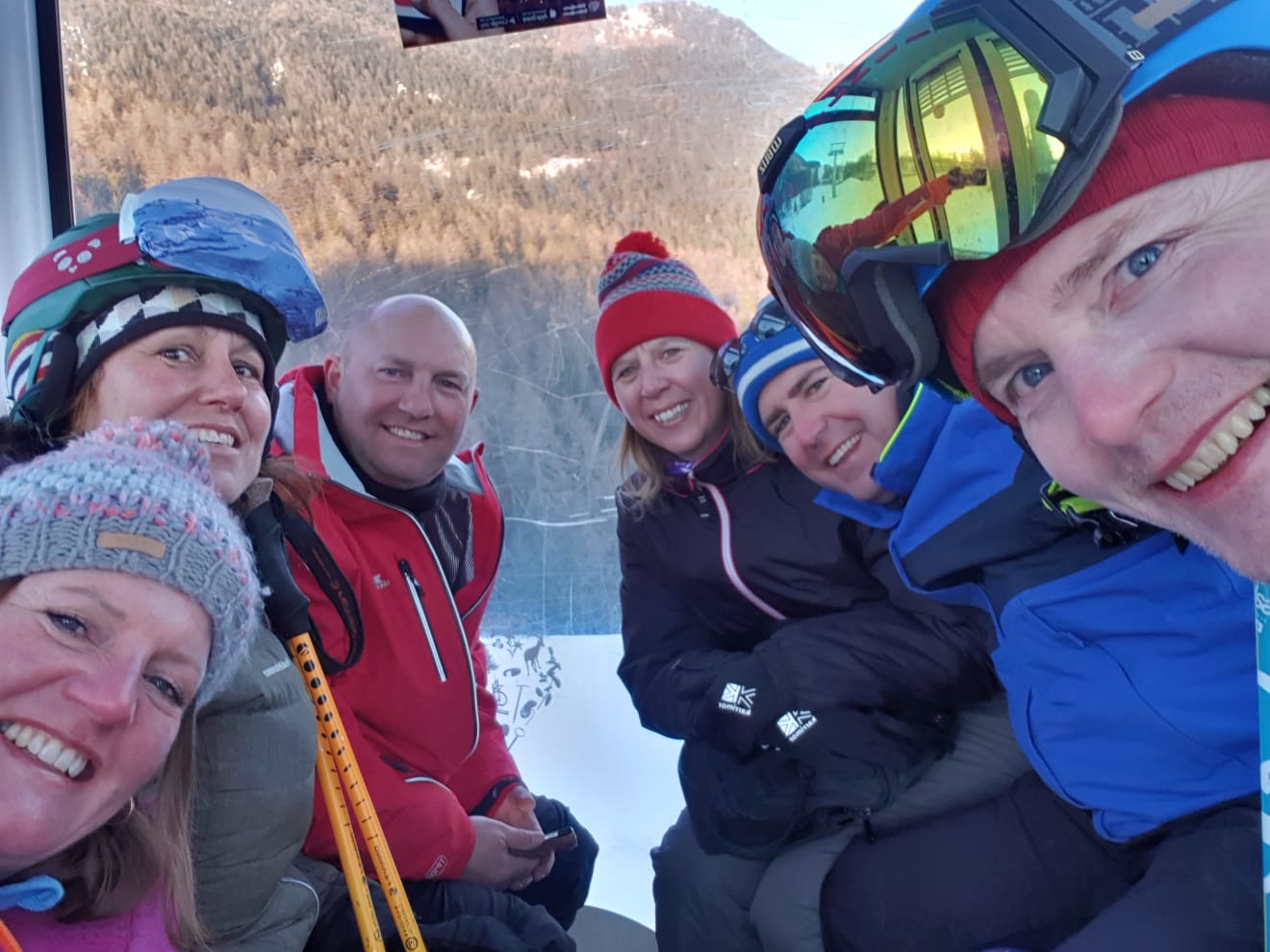 The grown-ups riding down the gondola from Pila. Our half term ski-safari holiday based in the Valdigne of Aosta Valley- Courmayeur, Pila and La Thuile.