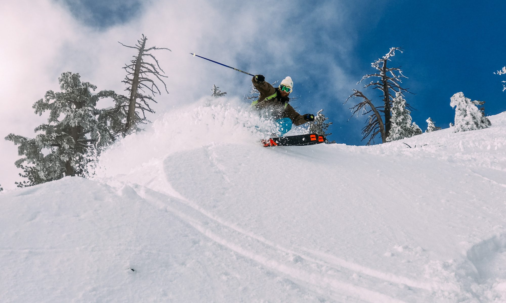 A skier enjoying the fresh powder at Mt Baldy. Photo by Robson Hatsukami Morgan. Unsplash. Mt Baldy, first American Ski Resort to open after COVID19, a social experiment?