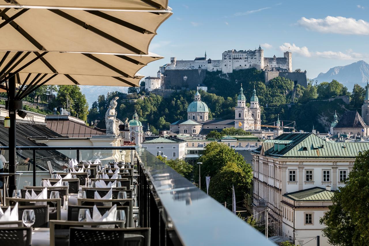 The terrace at the Imlauer Hotel Pitter Salzburg- what a view! For fanatics of Architecture, plan your multi-stop visit to Austria post Covid19.