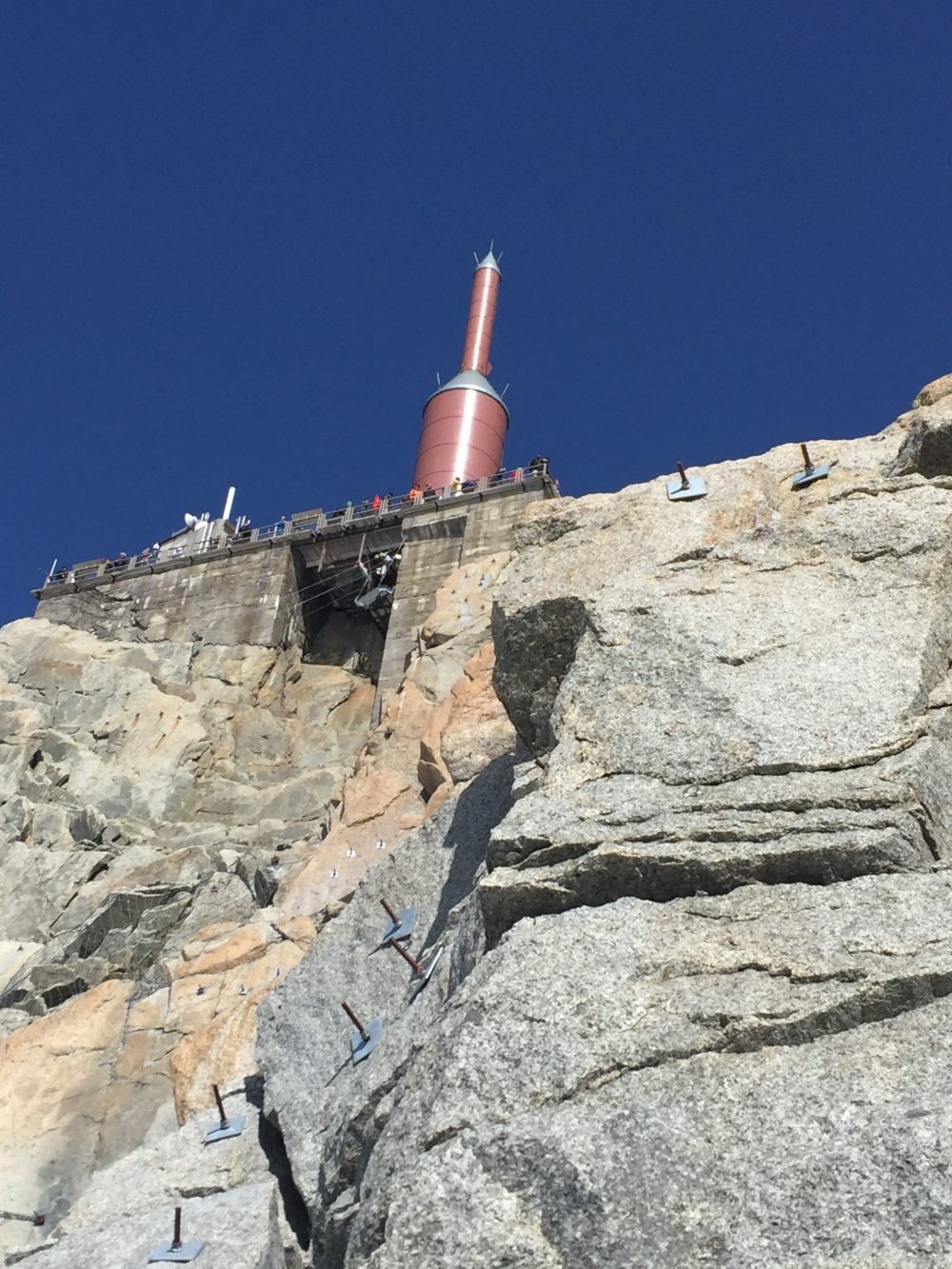 The characteristic top of Aiguille du Midi. Looks like a rocket to me. Aiguille du Midi vs Punta Helbronner – which one you should do?
