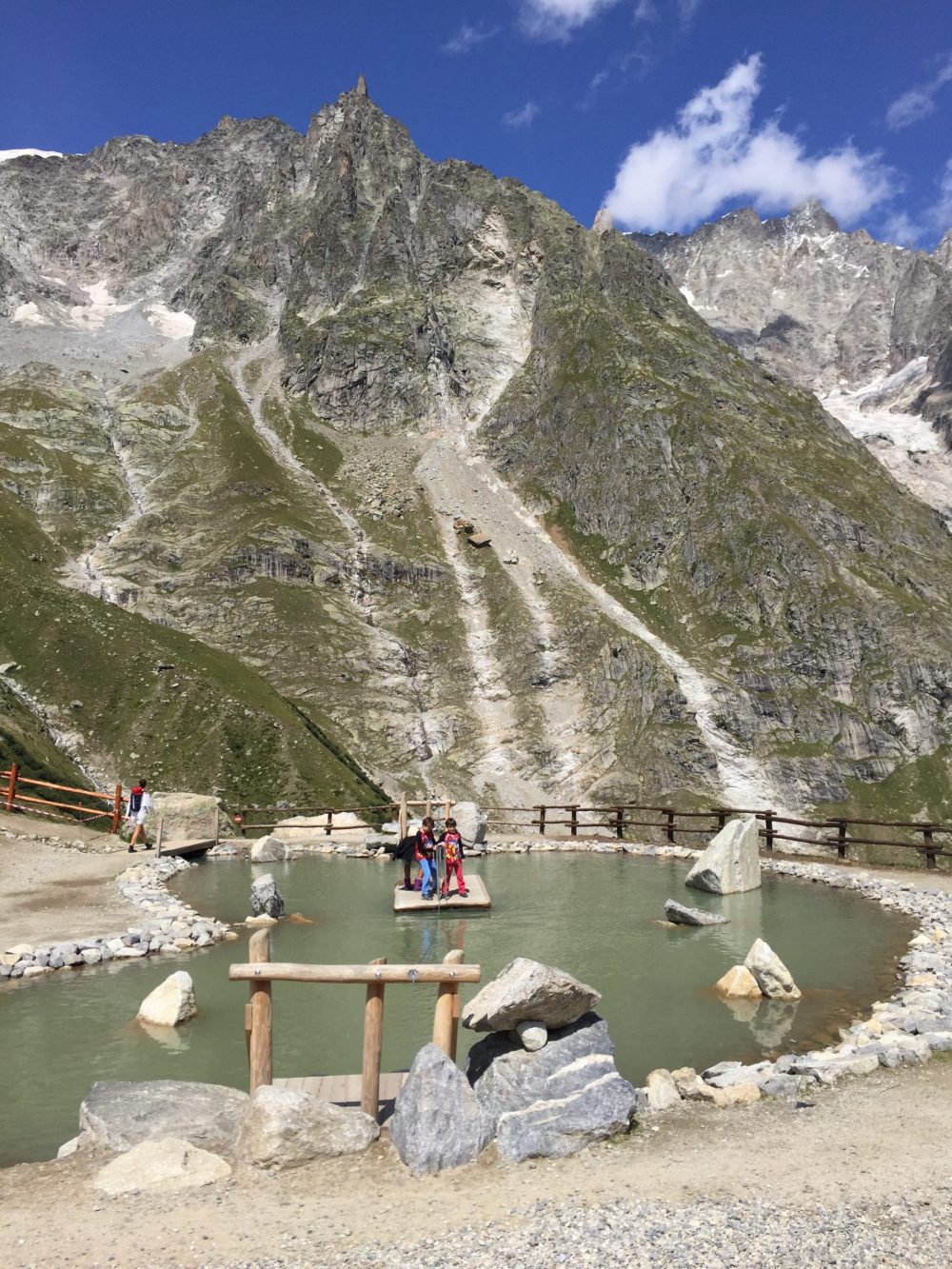 The boys on the raft crossing the water at Pavillion. Skyway Monte Bianco. Aiguille du Midi vs Punta Helbronner – which one you should do?