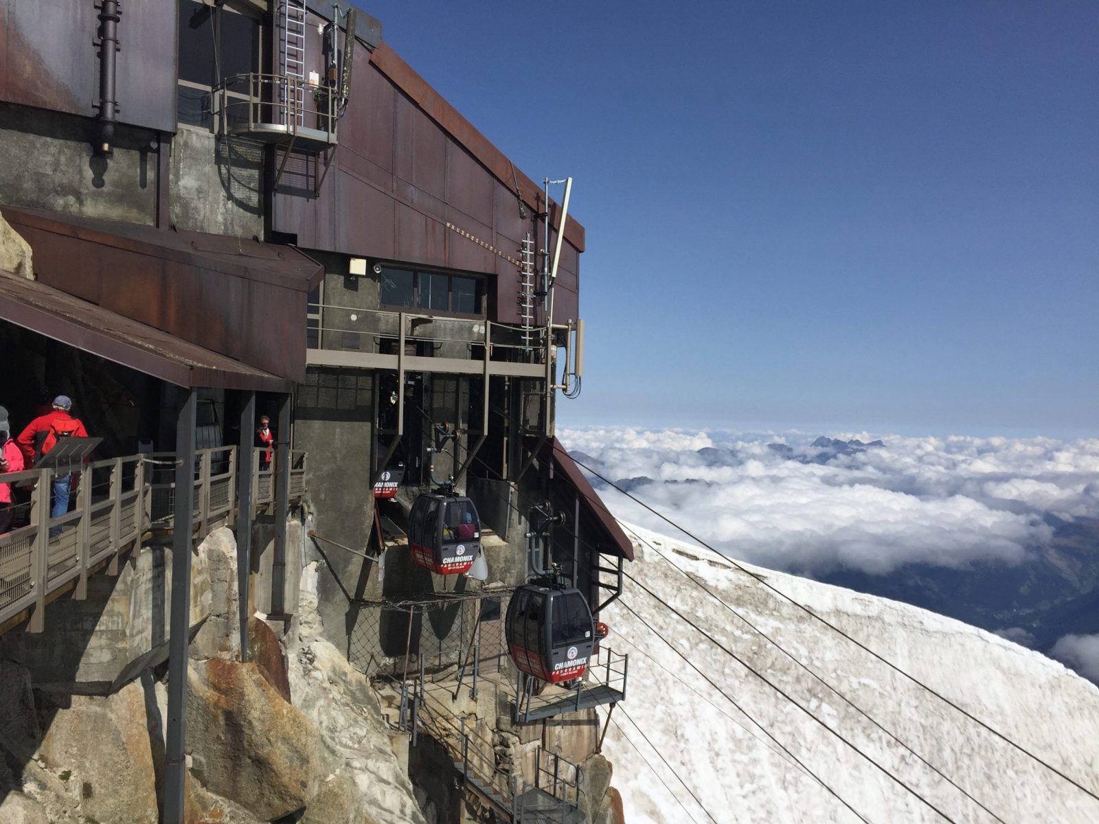 The departure of the Panoramic Mont Blanc Lift. We needed to go down and get going back to Troyes that night, but some day I'll get on it. Aiguille du Midi vs Punta Helbronner – which one you should do?