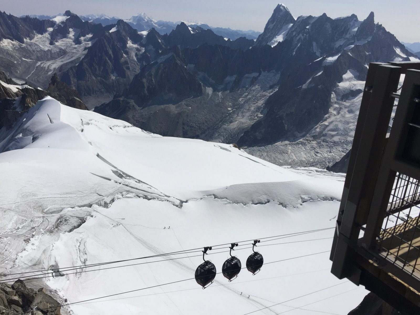 The Panoramic Mont Blanc lift connects Aiguille du Midi in France, with Punta Helbronner, in Italy. Aiguille du Midi vs Punta Helbronner – which one you should do?