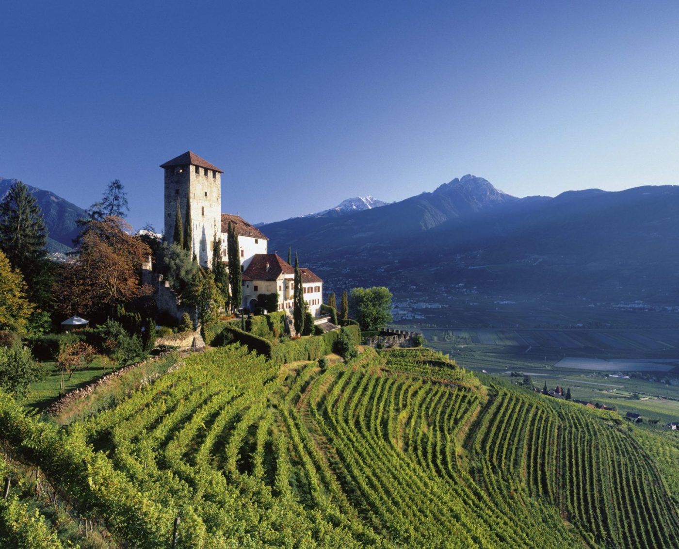 Photo: IDM South Tyrol / Clemens Zahn. Autumn is colorful in the Meraner Land, like here at Lebenberg Castle above Tscherms, where thanksgiving is celebrated. A Must-Read Guide to Summer in South Tyrol.