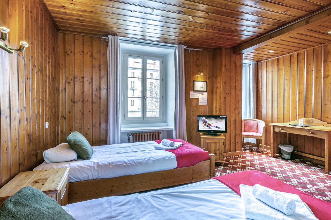 A room with wood panelling at the Hôtel Le Chamonix. Book your stay at the Hôtel Le Chamonix here. Must-Read Guide to Chamonix.