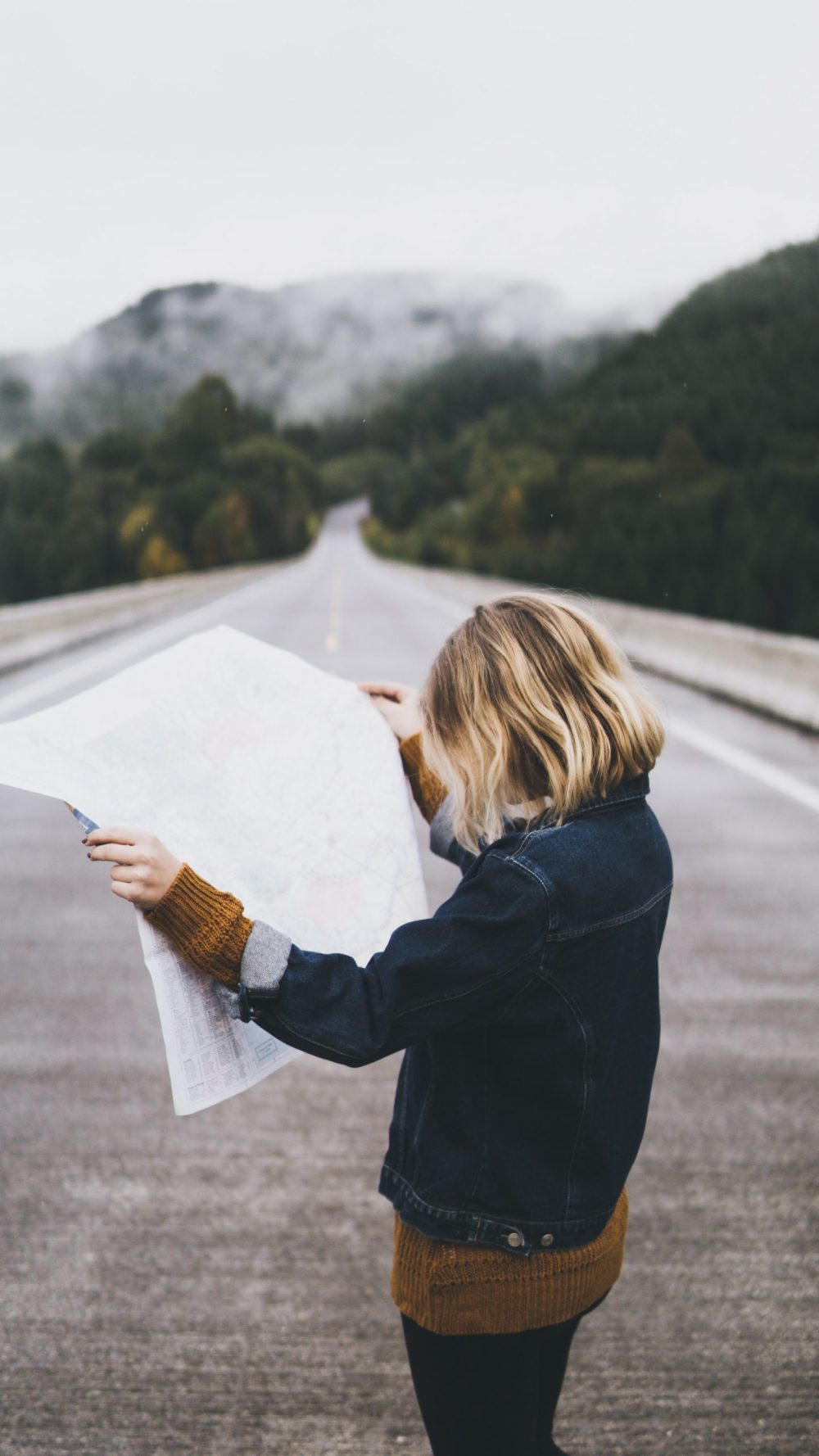 Comparing the Maps of the Alps. Photo by Daniel Gonzalez. Unsplash.