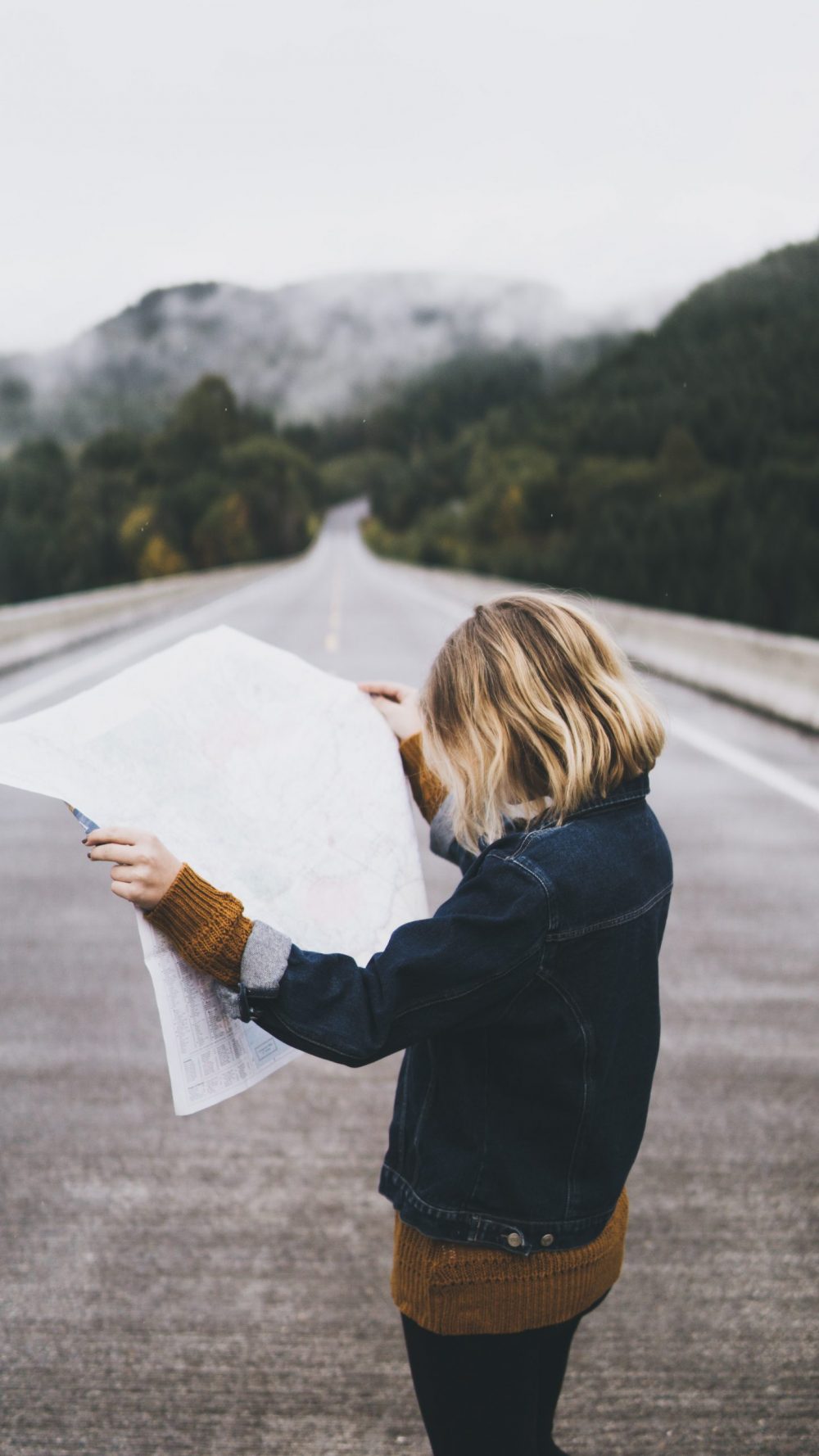 Comparing the Maps of the Alps. Photo by Daniel Gonzalez. Unsplash. 