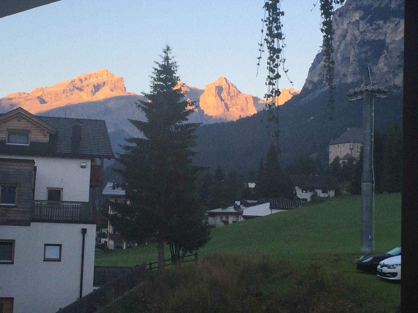 The Enrosadira effect in the mountains from the balcony in my room at the Hotel Antines. Book your stay at the Hotel Antines here. Planning your summer in the mountains of Alta Badia. 