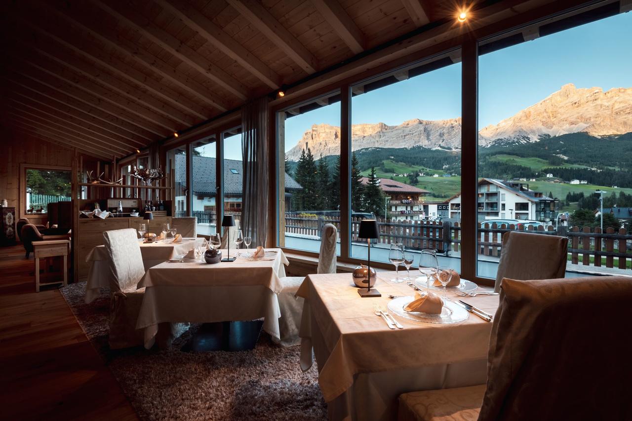 The dining room at the Hotel Antines in La Villa. Book your stay at the Hotel Antines here. Planning your summer in the mountains of Alta Badia. 