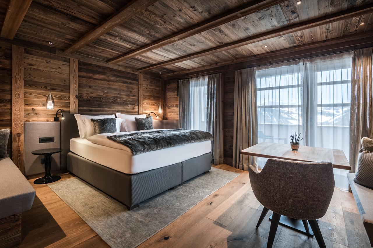 A room at the Kolfuschgerhof. Book your stay at the Hotel Kolfuschgerhof here. Planning your summer in the mountains of Alta Badia. 