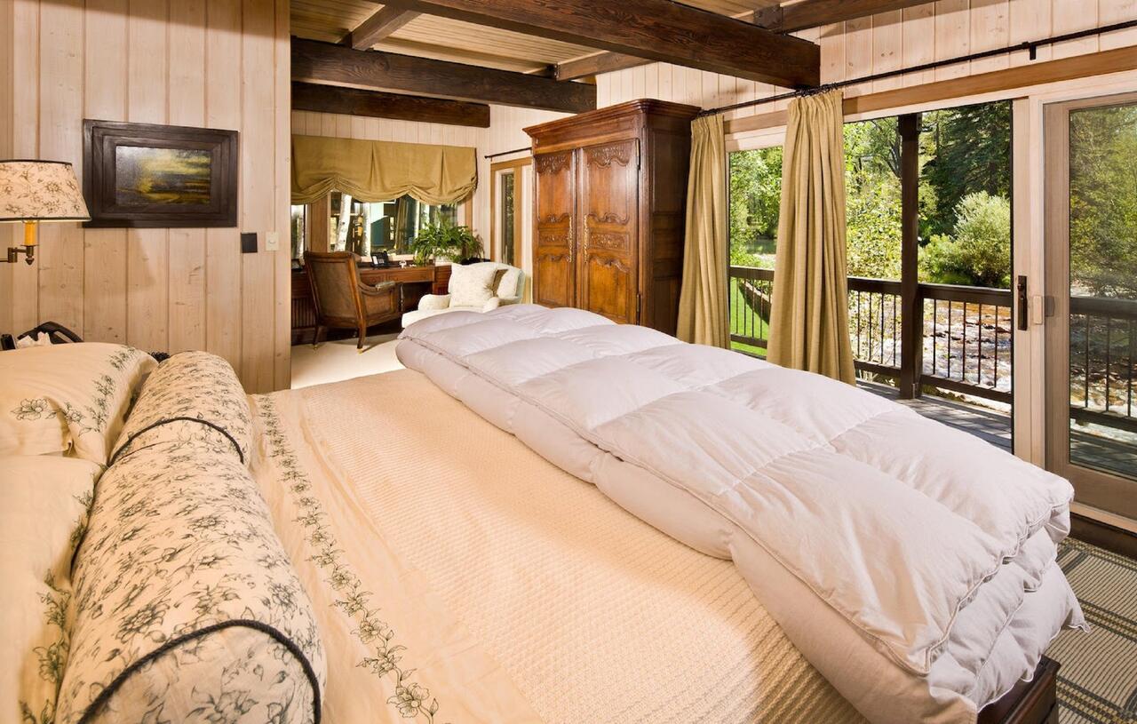 One of the bedrooms at this riverfront property in Aspen. Book your stay in this house in Aspen here. Aspen Snowmass is opening for the Summer Season.