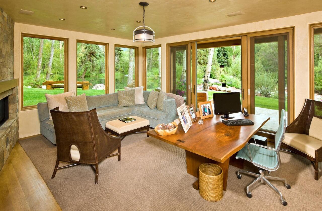 The living area on the riverfront house in Aspen. Book your stay at this house in Aspen here. Aspen Snowmass is opening for the Summer Season.