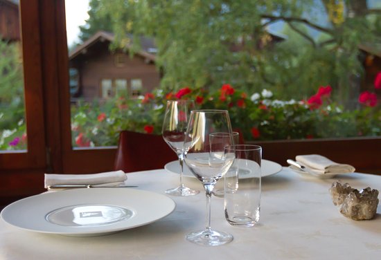 A table by the window at the Restaurant Albert 1er. Must-Read guide to Chamonix.