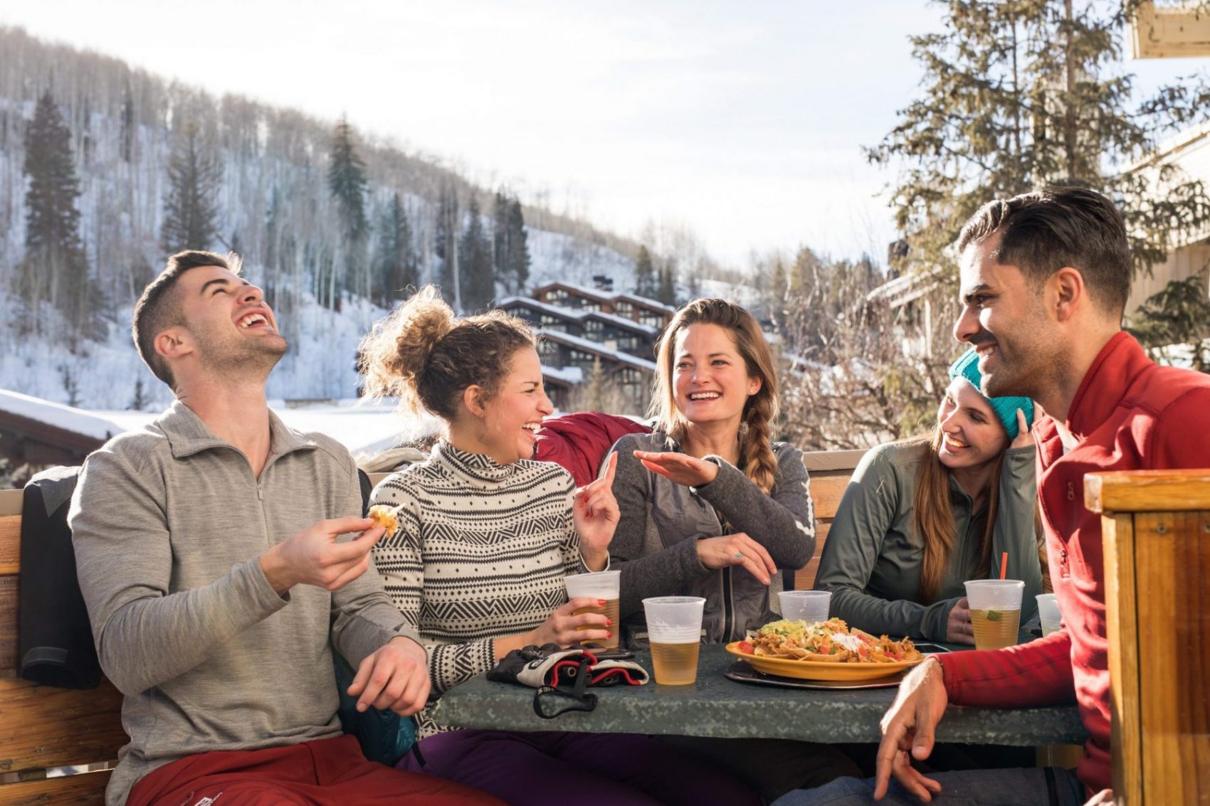 Some friends enjoy après after skiing in Vail, CO. Photo: Craig Orsini. Vail Resorts. The Must-Read Guide to Vail.