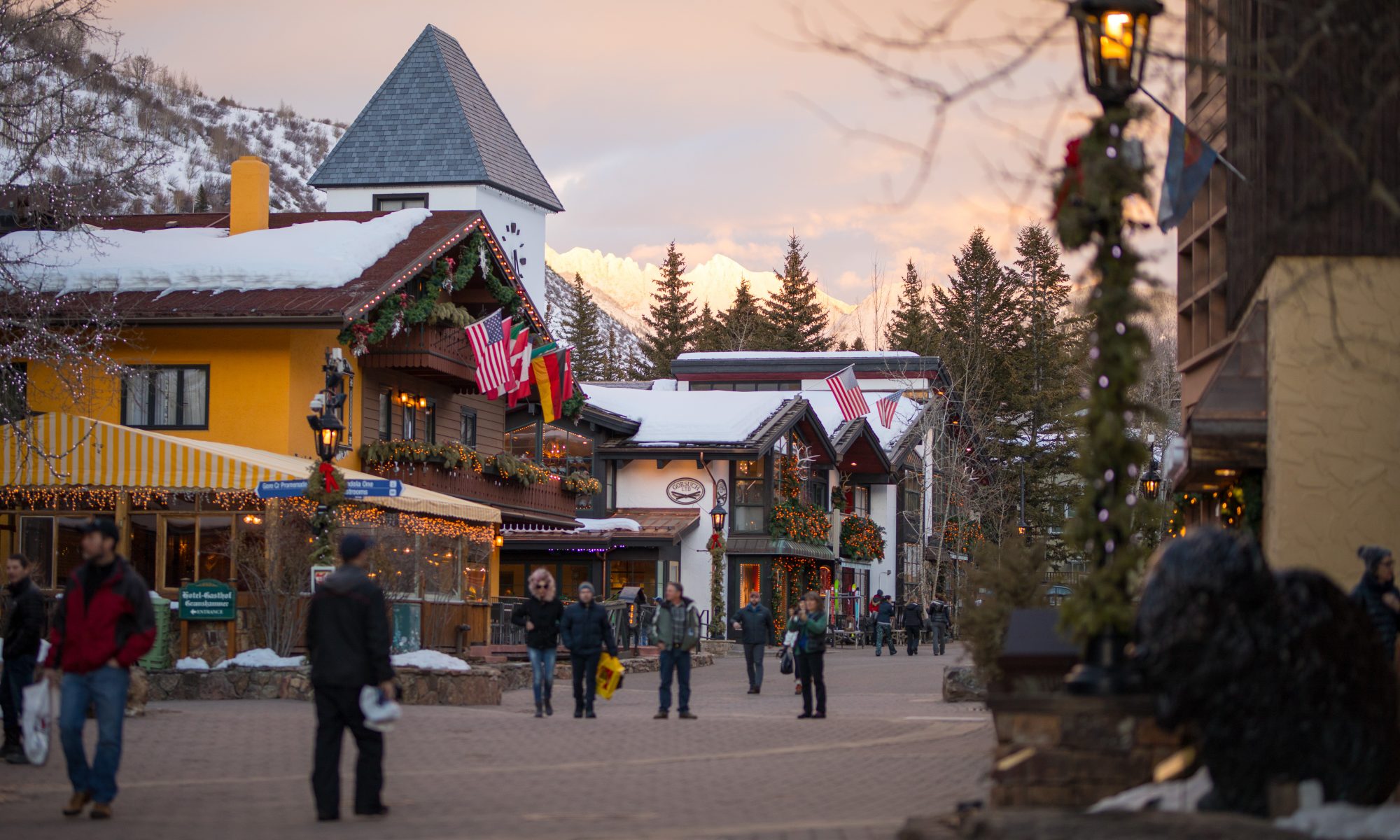 Vail's iconic village with the Gore Range Mountains capturing the sunset in Vail, CO. Photo- Craig Orsini, Vail Resorts. The Must-Read Guide to Vail.
