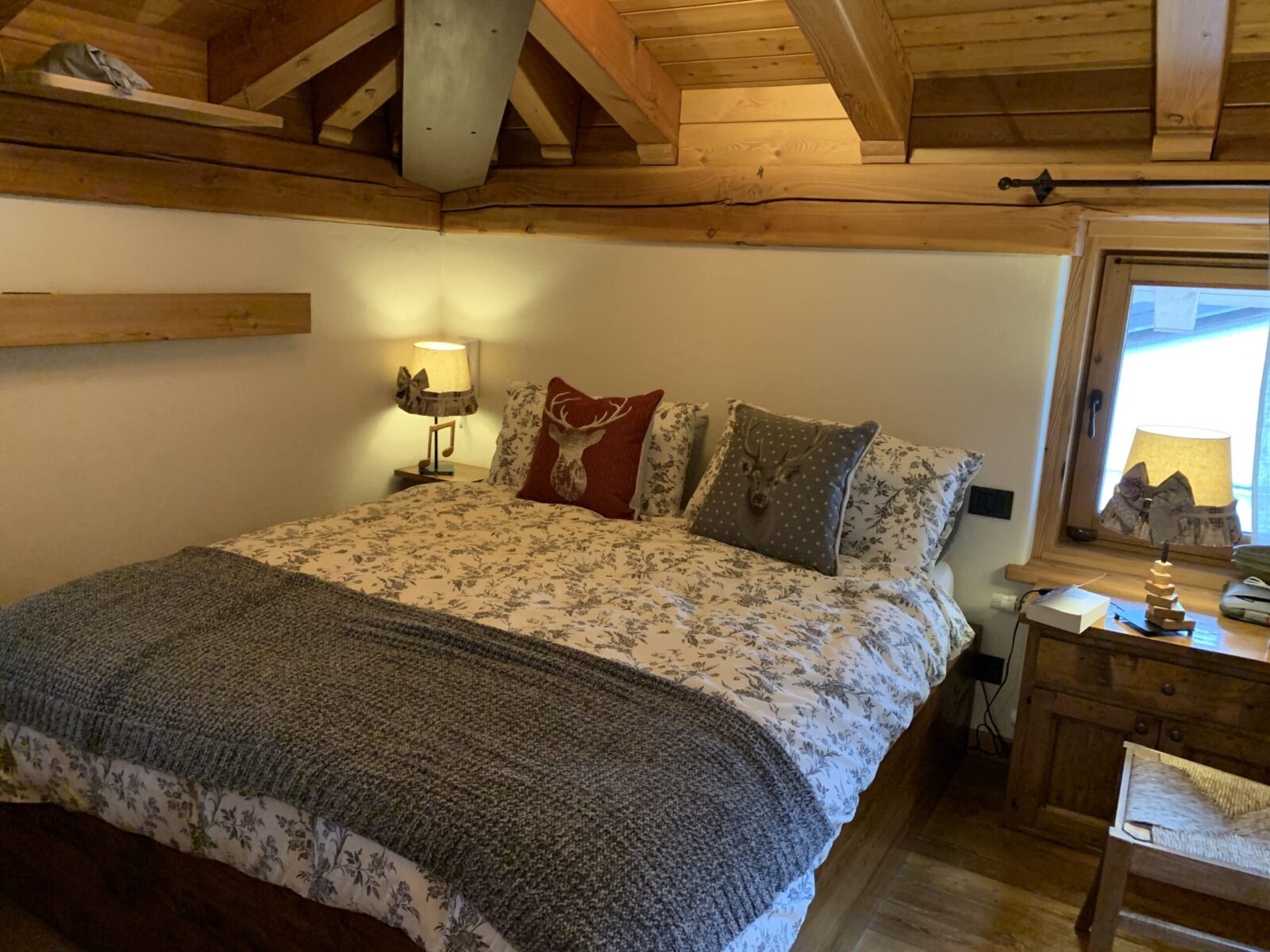 The master bedroom at Il Cuore della Valdigne. Book your stay at Il Cuore della Valdigne here. Family trek to Lago d' Arpy, Morgex, AO.