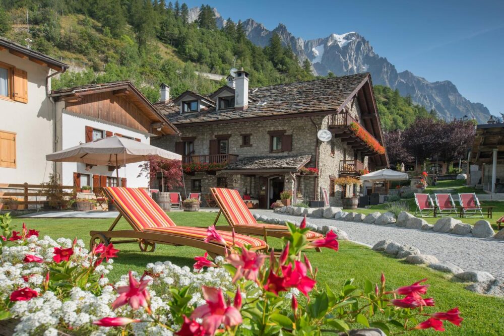 Hotel La Grange, exterior in summer, lovely tucked in Entrèves with its amazing vistas. Book your stay at Hotel La Grange here. Skyway Monte Bianco. Courmayeur Mont Blanc announces new sustainability strategy to 'save the glacier'.