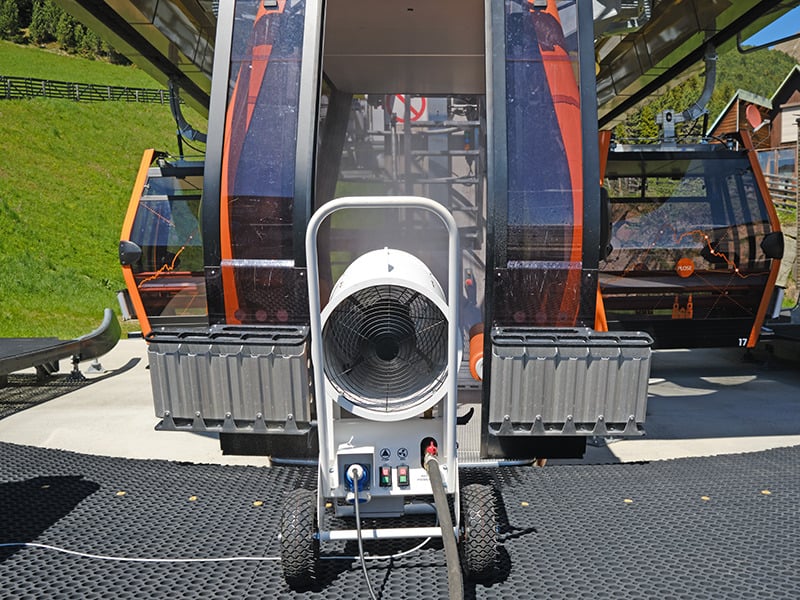 Demaclenko's machine is disinfecting a cablecar. Demaclenko is launching a new way to clean cablecars on the go. 