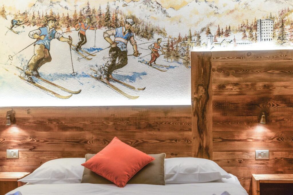 I love the detail of the wall of skiers coming down in Sestrière. Might need to draw it myself now! Book your stay at the Hotel Serendipity here. How Italian Ski Resorts are preparing for the ski season.