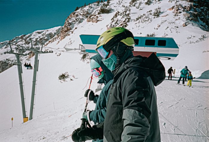 Two masked skiers in Little Cottonwood, Utah. Photo by Jake Green. Unsplash. Summary of a non-season, and how things are looking now for a summer in the mountains.