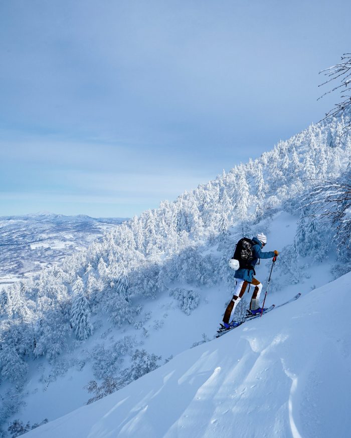 Skinning up the mountain. Photo: Ecoski. EcoSki- a new way to think about ski clothing