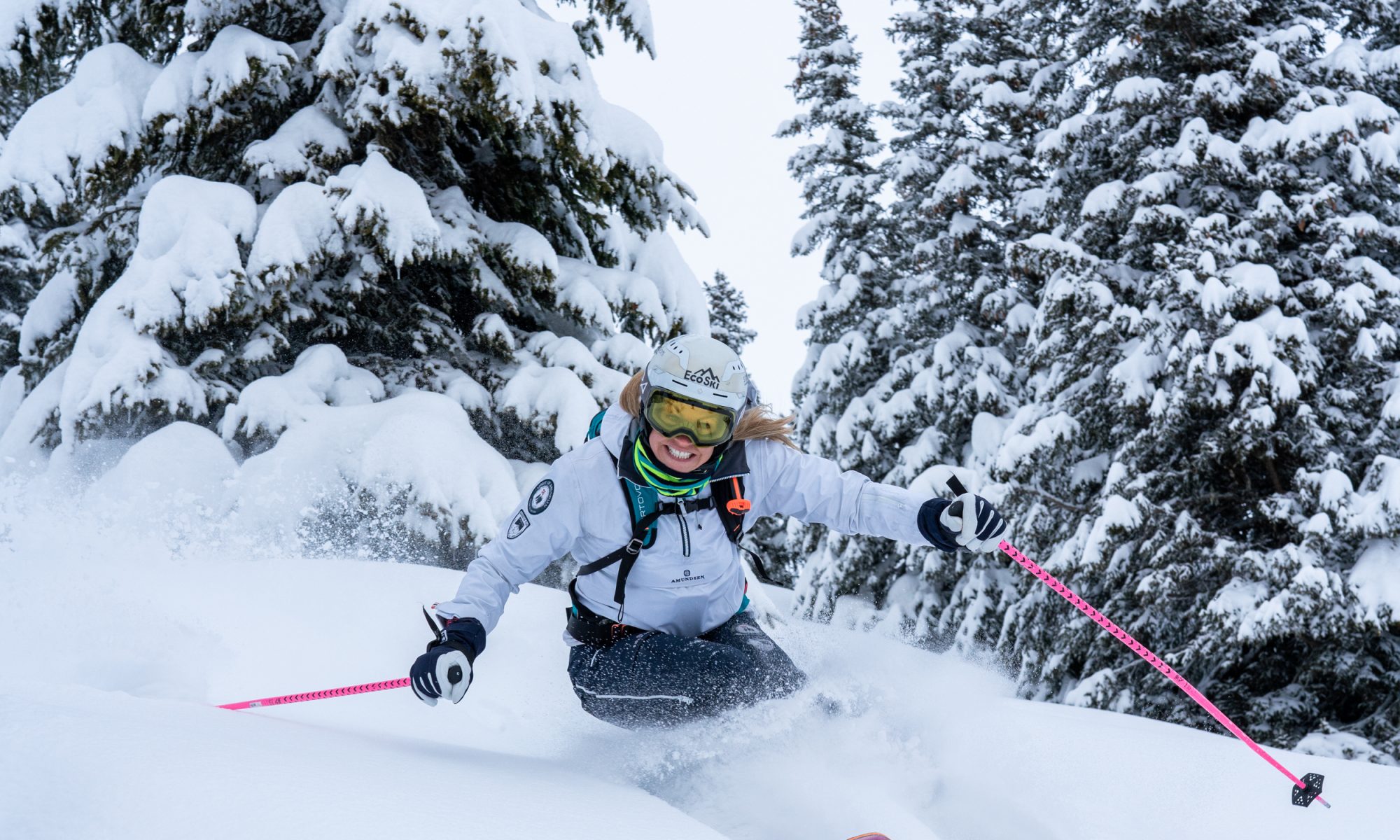 Chemmy Alcott is charging down the mountain on skis. Chemmy is an ambassador of EcoSki. EcoSki- a new way to think about ski clothing. Photo: EcoSki.