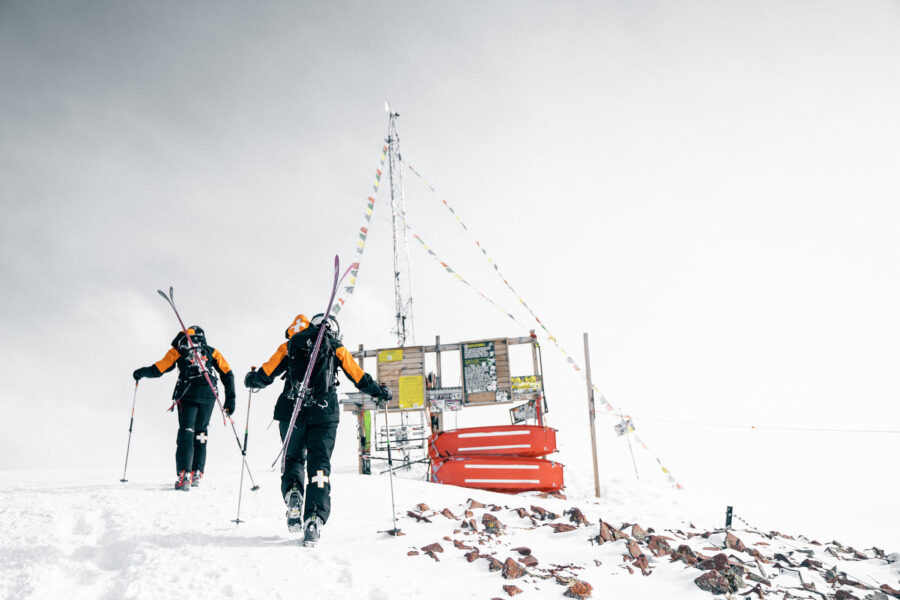 The Aspen Ski Patrollers in the ski area boundary of Aspen Highlands. Photo: Oliver Sutro- Aspen Snowmass. $75 Airfare Offering into Aspen; Book by Friday, Oct. 8. 