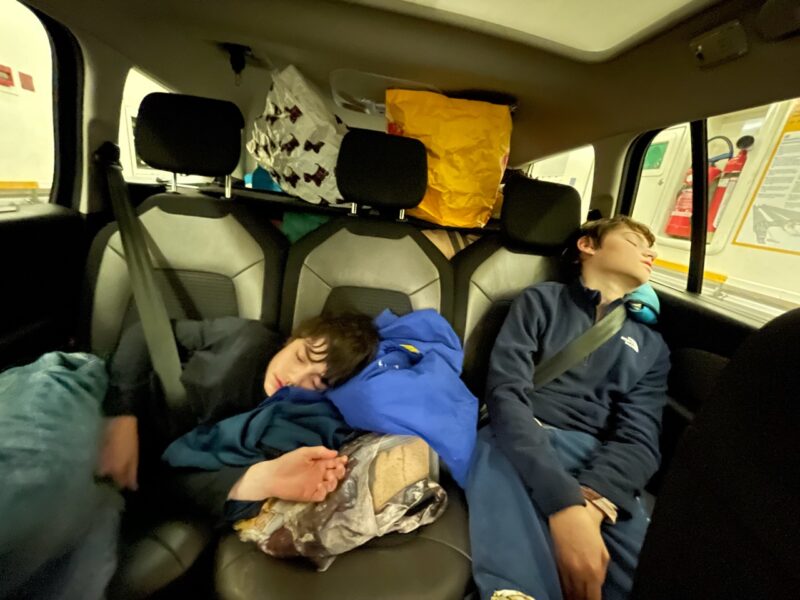 Tired kids in the car. Our Half Term Ski Safari Trip to the Aosta Valley