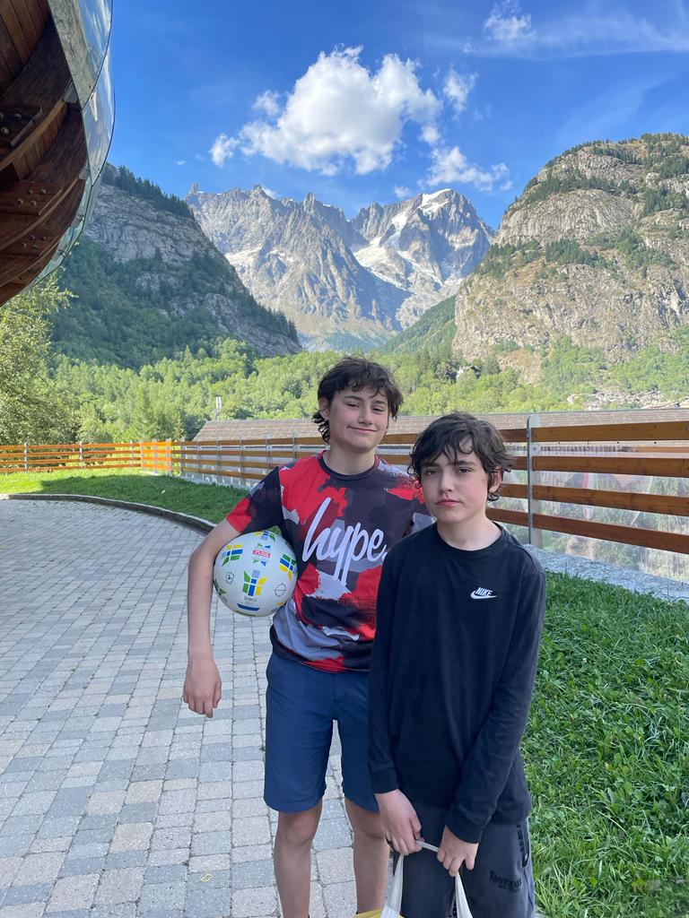 The boys by the Dolonne ticket office after a great day at the Piscina Alpina di Courmayeur. Photo: The-Ski-Guru