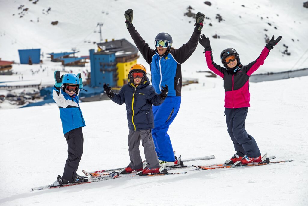 Ann Schorling and her ski school students having fun on the ski hill. Photo Courtesy Ski Portillo. 