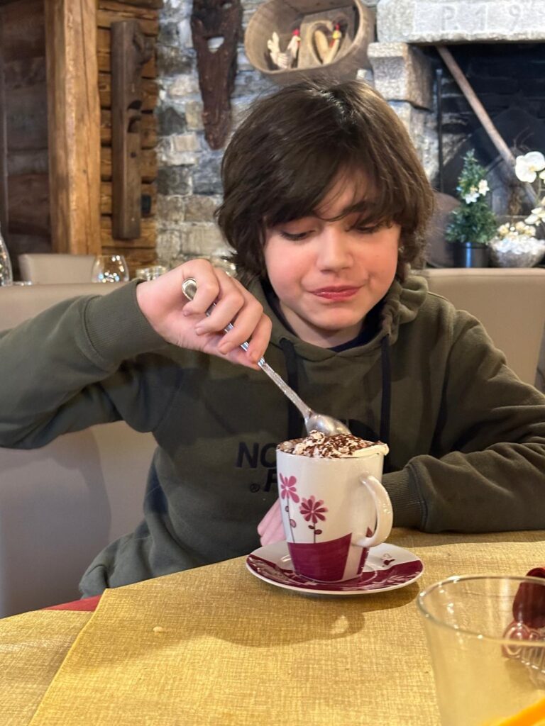 Lovely restaurant in Planaval, the furthest you can go from La Collina di La Salle. A beautiful wooden chalet that oozes coziness.. my youngest here enjoying an indulging hot chocolate as dessert (any excuse is good for him!) Photo: The-Ski-Guru