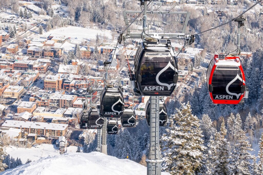 The town of Aspen seen from Aspen Mountain, with the recognised Silver Queen Gondola. Photo: Jordan Curet. Courtesy: Aspen Snowmass. The Must-Read Guide to Aspen Snowmass.